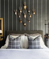 A Parisian-Inspired Bachelor Pad with Warmth and Style