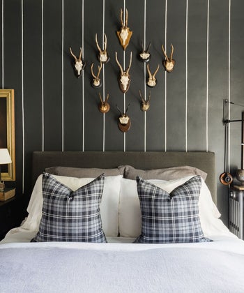 A Parisian-Inspired Bachelor Pad with Warmth and Style