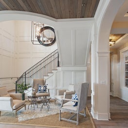 A grand space for intimate conversation. Natural linen, seagrass and white.