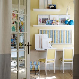 Chic, bright yellow and blue desk area