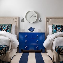 A shipshape guest room combines nautical and tropical elements.
