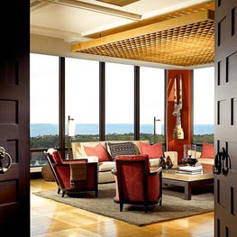Wood architectural ceiling details add character to this modern living room.