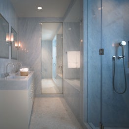 Marble master bathroom in NYC apartment, double sinks, full length mirror