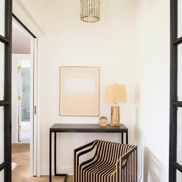 Seattle. Bedroom Entry with stacked plywood impression chair by Julian Mayor.