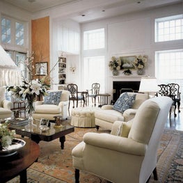 This neutral transitional living room has a serene, tranquil atmosphere.