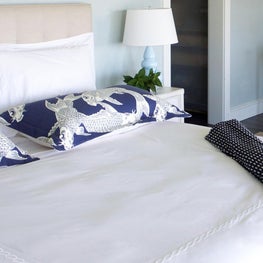 Navy and white patterned modern upholstered bed