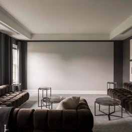 Seattle. Screening Room with custom tufted seating by Todd Merrill Studio.