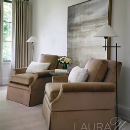 A refined mix of custom furnishings, drapery, and subtle contrast elevates the bedroom’s serene, retreat-like character.