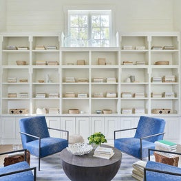 Study, Seating Area, Blue Lee Industries Chairs, Custom John Rosselli fabric, Noir Cocktail Table, Stark Rug, Built-In Shelving— Pine Lake Project