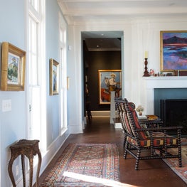 A contrast of rich color against classic white millwork and soft hued walls.