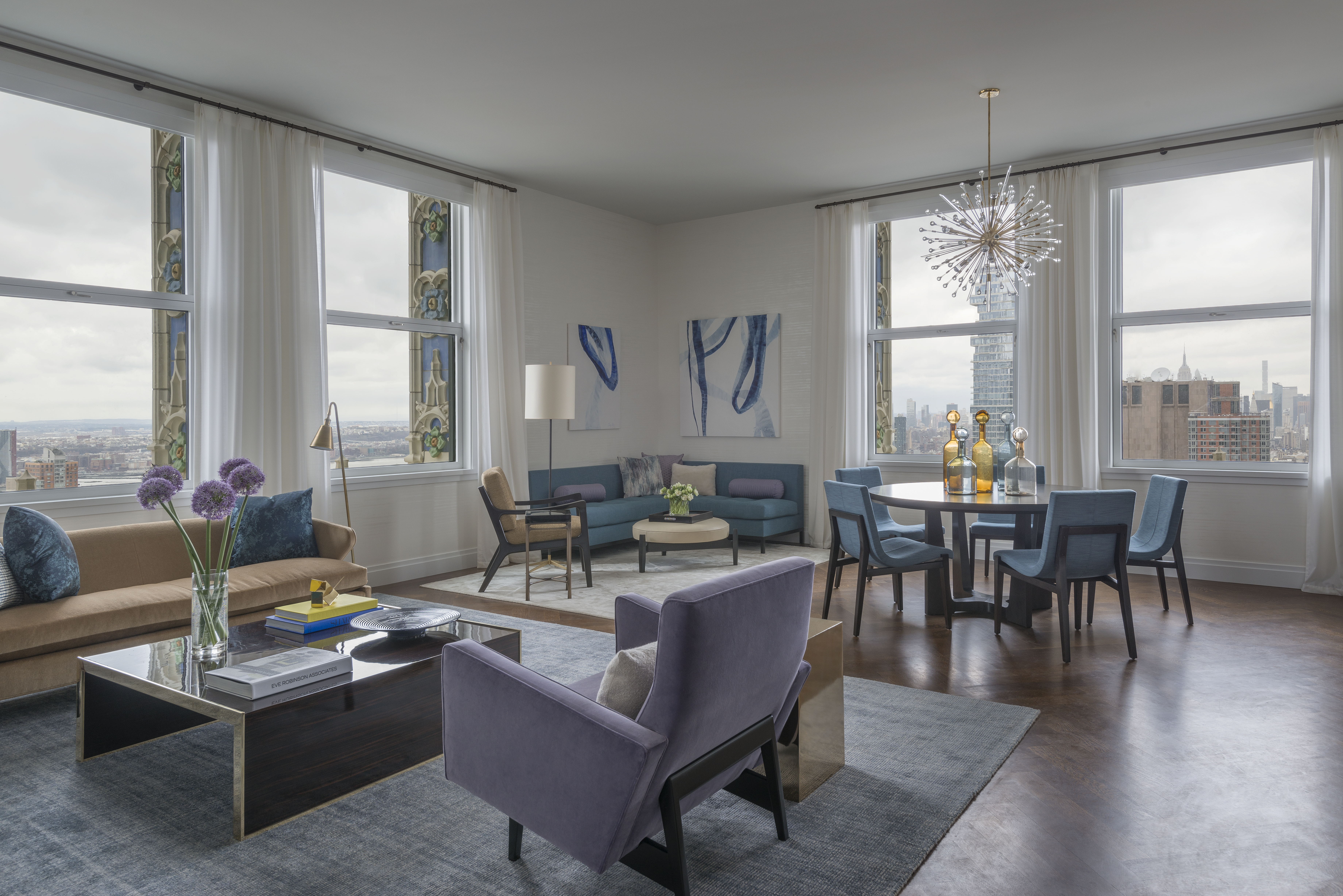 NYC Apartment living room, dining room, mixed seating options,sputnik chandelier