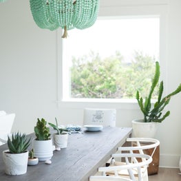 Bohemian Beach House. Dining Table. Turquoise Chandeliers. Moroccan Vibe.  