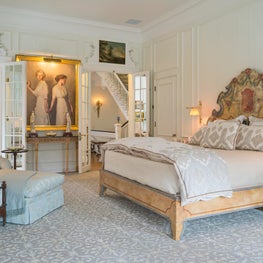 Boston townhouse, master bedroom with a 19th Century Venetian headboard