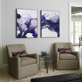 Digital art added color to family room with  Jessica Charles swivel chairs