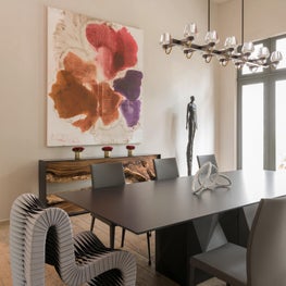 Contemporary dining space with modern furniture + abstract art; Houston, Texas