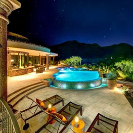 Night lighting adds ambiance for an incredible space to relax on a warm evening.