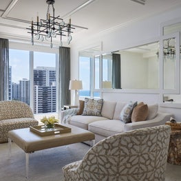 Contemporary family room with custom mirror to highlight the stunning ocean views