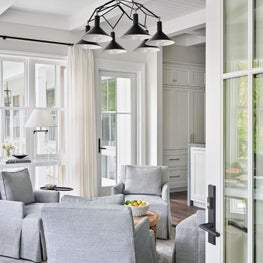 Sitting Area, Lee Industries Grey Armchairs, Tucker Robbins Round Coffee Table, Acrylic Floating Console, Stark Carpet Rug - Coastal-Inspired Chicago Project