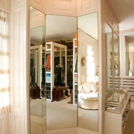 Three way mirror with storage behind it 