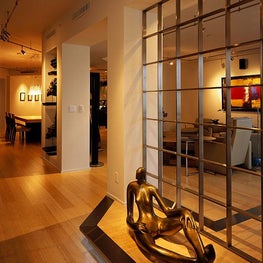 This interior was designed to retain a spacial open feeling with an asian flair.