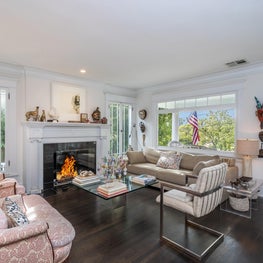 Traditional East Coast Living Room  accompanied by artifacts from around the world.
