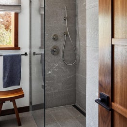 Soulful Home Bathroom with Waterworks Tiles and Vola shower fitting
