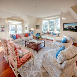 Various patterns throughout the seating area gives the room an eclectic twist.