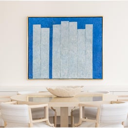 A George Constant sets the stage for this city dining room. 