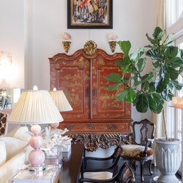 Chinoiserie rules in this eclectic living room space