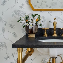 Black & White Powder Room Detail with Modern Floral Wallpaper & Brass