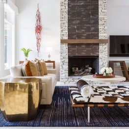 Portfolio: Living room featuring a custom sofa and cowhide Mies van der Rohe-style daybed 