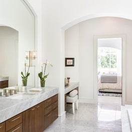 Portfolio: Beautiful and elegant bath with marble floors and counter-tops