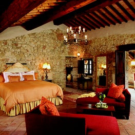 Luxurious colors and textures combine to create one sophisticated master suite