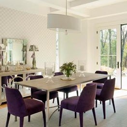 Dining Room with Velvet Upholstered Chairs and Wallpaper