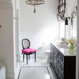 Black & white girls bath-decorative tiling, custom colored sconces & pop of pink