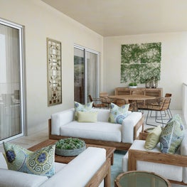 Teak framed outdoor furniture makes for a great space for entertaining.