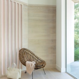 East Hampton Residence - modern foyer with oak panelling & cane chair