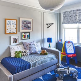 Fun kids room with blue polka dot rug