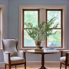 Wallpaper and Painted Trim with Bay Window Seating Area