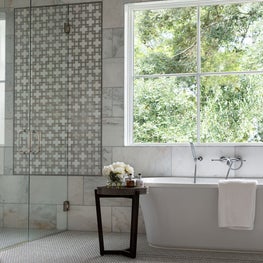 Portfolio: Stunning bathroom with marble wall and window view