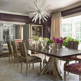 Historic Chestnut Hill Dining Room with Purple Walls and Large Chandelier
