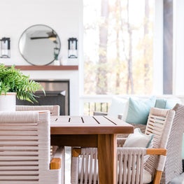 Super cool outdoor dining chairs on screen porch