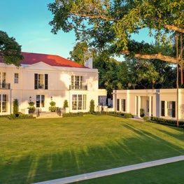 The classical Georgian facade of an updated Palm Beach Landmark