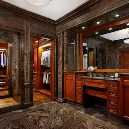 Masculine mahogany and marble details in a man's master bath and dressing room 
