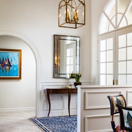 The entry has French doors that create a natural source of light.