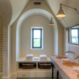 Boys Bunk Bathroom with  Antique Triple Basin Stone Sink and Arched Window Seat