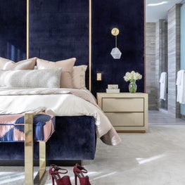 Portfolio: Jewel-toned master bedroom with blue headboard and neutral accents