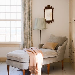 Upstate NY farmhouse, bedroom with upholstered chaise.