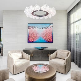 SLEEK CONTEMPORARY METALLIC RESIDENCE , modern chandelier, contemporary art, club chairs, bronze coffee table, tall gray sheer curtains