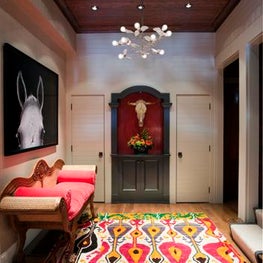 Hallway with Colorful Rug, Bench and Art